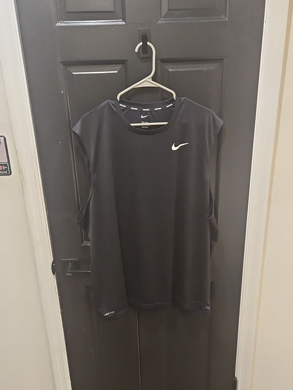 Nike Black Sleeveless Athletic Tank with White Swoosh